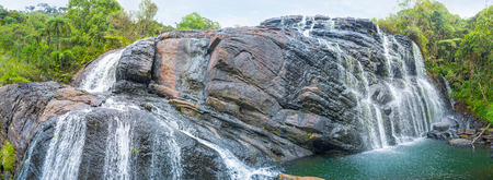 The view on the Baker's Fall, the biggest waterfall in Horton Plains Park, Sri Lankaの写真素材