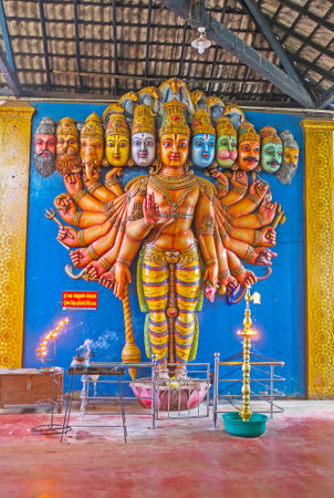 MUNNESWARAM, SRI LANKA - NOVEMBER 25, 2016: The sculpture of Vishnu Dashavatara with his ten avatars - heads of different Hindu Gods, stands at the wall of Munneswaram Kovil, on November 25 in Munneswaram.のeditorial素材