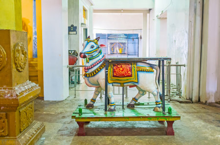MUNNESWARAM, SRI LANKA - NOVEMBER 25, 2016: The sculpture of the Sacred Bull Nandi also named Basava (vehicle of Lord Shiva), located in Munneswaram Kovil, on November 25 in Munneswaram.のeditorial素材