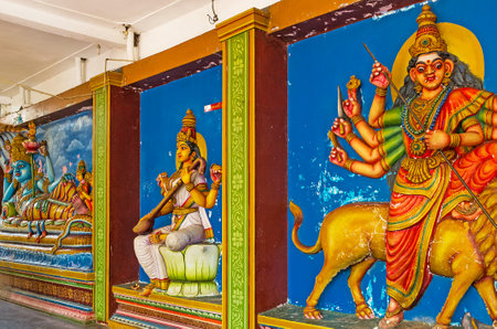MUNNESWARAM, SRI LANKA - NOVEMBER 25, 2016: The reliefed pannels depict God Vishnu with Laksmi, Goddess Saraswati, sitting on lotus and playing music and Goddess Durga, riding on lion, on November 25 in Munneswaram.のeditorial素材