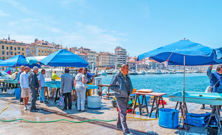 MARSEILLE, FRANCE - MAY 4, 2013: The fish market stalls in Old Port offers fresh fish and seafood to locals and tourists, on May 4 in Marseille.のeditorial素材