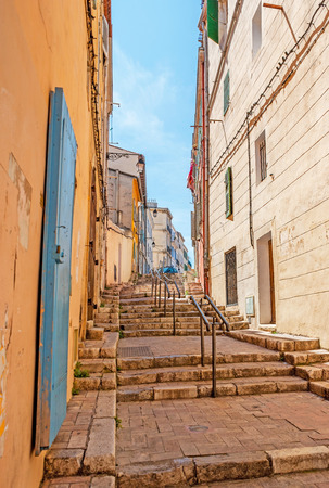 The old stone staircase in narrow Moulines street of Panier neighborhood, Marseille, France.の写真素材