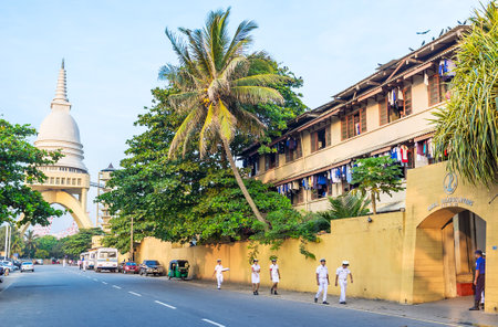 COLOMBO, SRI LANKA - DECEMBER 6, 2016: The building of Naval Headquarters and Sambodhi Chaithya Buddhist Temple, built on intersecting concrete arches on the distance, on December 6 in Colombo.のeditorial素材