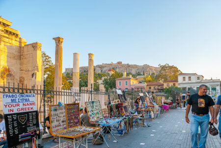 ATHENS, GREECE - OCTOBER 12, 2013: The streets around ruins of Hadrian's Libraryl are occupied with souvenir stalls, that offer a wide range of authentic greek souvenirs and jewels, on October 12 in Athensのeditorial素材
