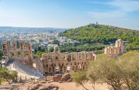 The view on preserved part of Odeon Herodes Atticus Theater from the hill of Acropolis, Athens, Greece.のeditorial素材