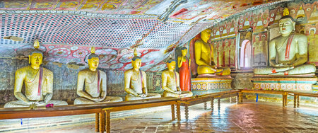 DAMBULLA, SRI LANKA - NOVEMBER 27, 2016: Panorama  of Maharaja Lena Cave (Great Kings) of Dambulla Monastery, decorated with ancient Buddhist patterns, murals and statues, on November 27 in Dambulla.のeditorial素材