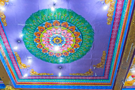 MATALE, SRI LANKA - NOVEMBER 27, 2016: The colorful ceiling of Muthumariamman Kovil - Tamil Hindu Temple decorated with rosette of peacock's feathers and lotus flowers, on November 27 in Matale.のeditorial素材