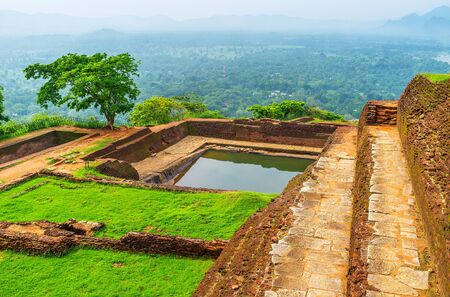 The top of Sigiriya Rock is the interesting place to discover the ancient ruins and overlook the landscapes, located around the Rock, Sri Lanka.の写真素材