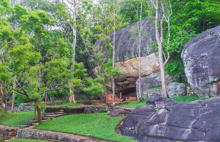The numerous caves in Sigiriya rocks were used by Buddhist monks as shelters or temples, Sri Lanka.の写真素材
