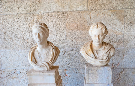 ATHENS, GREECE - OCTOBER 12, 2013: Well preserved marble women busts on Stoa of Attalos museum, on October 12 in Athensのeditorial素材