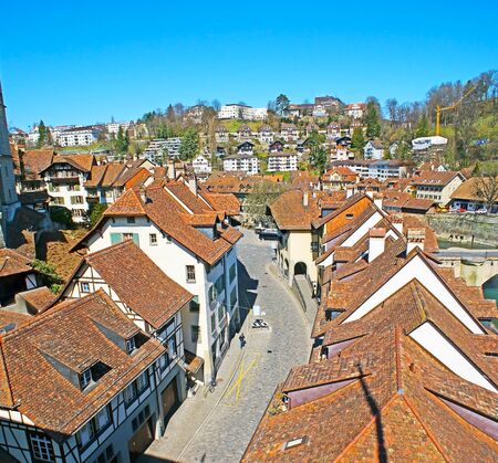 The narrow winding streets of historical Mattequartier neighborhood, stretching along the bank of...
