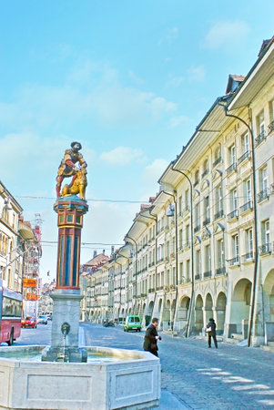 BERN, SWITZERLAND - MARCH 3, 2011: The Simsonbrunnen (Samson fountain) is the medieval landmark of...