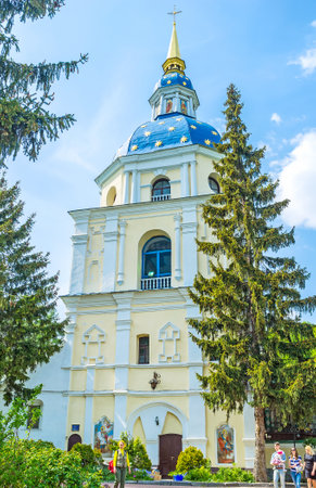 KIEV, UKRAINE - MAY 2, 2016: Bell Tower with golden stars on the dome of Vydubychi Monastery is most...