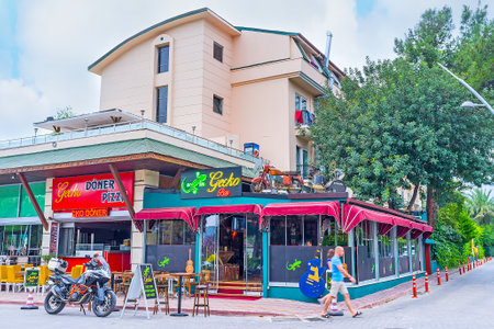 KEMER, TURKEY - MAY 5, 2017: The city center is full of tourist cafes and bars, offering cuisine on each taste and price, on May 5 in Kemer.のeditorial素材