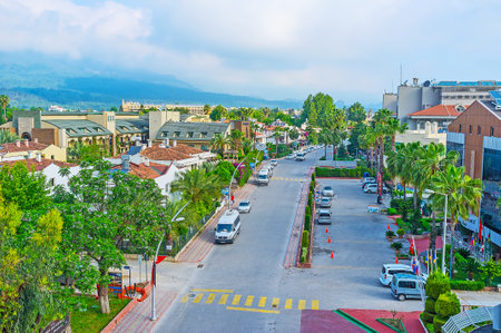 KEMER, TURKEY - MAY 6, 2017: Deniz street is one of the central city roads with numerous hotels, cafes and stores, also there are a lot of greenery here, on May 6 in Kemer.のeditorial素材