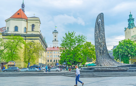 LVOV, UKRAINE - MAY 16, 2017: The bronze element of Taras Shevchenko monument, named Wave of the National Revival, Svobody avenue, on May 16 in Lvov.のeditorial素材
