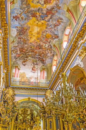 LVOV, UKRAINE - MAY 16, 2017: The prayer hall of St Andrew the First Called church is perfect example of Baroque interior with splendid decors, on May 16 in Lvov.のeditorial素材