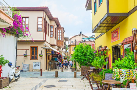 ANTALYA, TURKEY - MAY 6, 2017: Historic streets of Kaleici district are full of preserved Ottoman townhouses, that nowadays became the hotels, cafes, bars, souvenir stores, on May 6 in Antalya.のeditorial素材