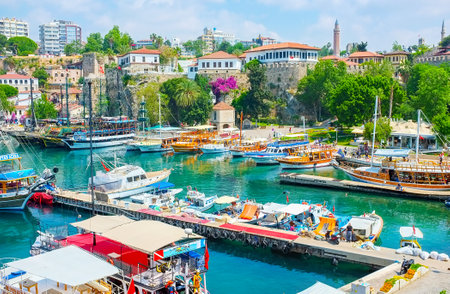 ANTALYA, TURKEY - MAY 6, 2017: The old marina is the center of sea tourism - the pleasant trips, interesting cruises, fishing tours or even dinner on yacht can be found here, on May 6 in Antalya.のeditorial素材