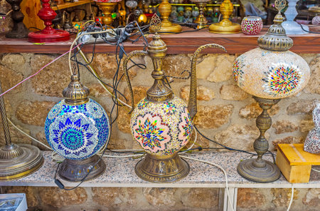 ANTALYA, TURKEY - MAY 6, 2017: Traditional arabian lights with colorful patterns of stained glass, designed as oriental coffee pots, on May 6 in Antalya.のeditorial素材