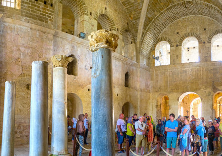DEMRE, TURKEY - MAY 7, 2017: The group of tourists in nave of St Nicholas Church, the main christian shrine of the region, on May 7, in Demre.のeditorial素材
