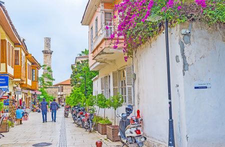ANTALYA, TURKEY - MAY 6, 2017: The walk along historic street of Kaleici with the view on the broken minaret of Kesik Minare Camii mosque, on May 6 in Antalya.のeditorial素材