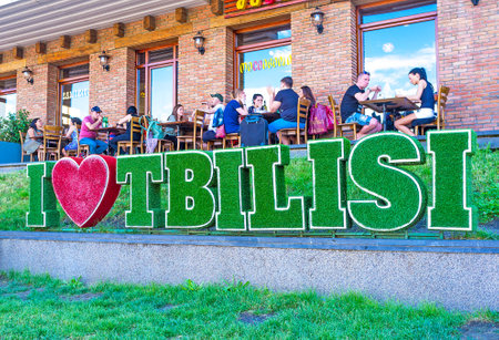 TBILISI, GEORGIA - JUNE 5, 2016: Inscription ''I love Tbilisi'' on the green zone in Vakhtang Gorgasali Square, in front of the restaurant, on June 5 in Tbilisi.のeditorial素材
