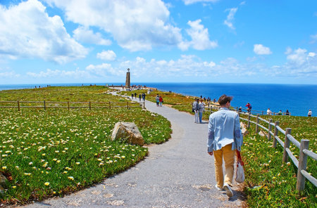 SINTRA, PORTUGAL - MAY 1, 2012: The walk along the way to the westernmost point of Europe - Cabo da Roca (Cape Roca), the rocky cliff, washed by Atlantic ocean, on May 1 in Sintra.のeditorial素材