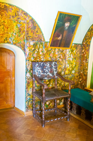 MOSCOW, RUSSIA - MAY 11, 2015: Cabinet in Palace of Romanov Boyar is a small chamber with richly decorated walls and beautiful carved furniture, on May 11 in Moscowのeditorial素材