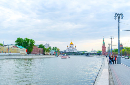 MOSCOW, RUSSIA - MAY 11, 2015: The view on Moskva River with Vodovzvodnaya tower and Cathedral of Christ the Saviour on the background, on May 11 in Moscowのeditorial素材