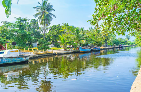 The Hamilton's Canal, stretching between Colombo and Negombo is surrounded by lush tropic gardens, palm plantations, villages, and forests, Wattala suburb, Sri Lanka.のeditorial素材