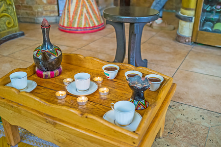 The coffee ceremony is important part of Ethiopian culture and history, nowadays it's performed in many countries in ethnic cafes and coffee houses.の写真素材