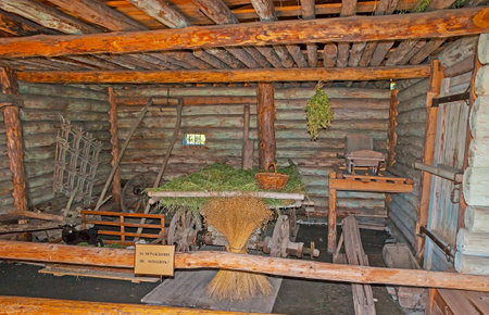 SUZDAL, RUSSIA - JULY 1, 2013: The old timbered barn for agricultural tools, hay and straw, located in museum of Wooden Architecture and Peasant life, on July 1 in Suzdal.のeditorial素材