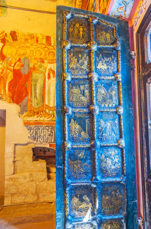 SUZDAL, RUSSIA - JULY 1, 2013: The open golden door of Nativity Cathedral in Kremlin was created by using difficult technique of  fusing gold, on July 1 in Suzdal.のeditorial素材
