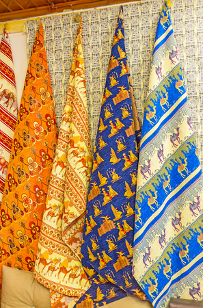 The colorful tableclothes, decorated with camels, elephants, floral and Islamic patterns are popular gifts from Antalya, Turkey.の写真素材