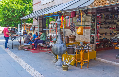 ANTALYA, TURKEY - MAY 12, 2017: The metalwork market is the interesting tourist attractions with wide range of souvenirs, traditional Eastern goods and oportunity to watch the masters at work at their workshops, on May 12 in Antalya.のeditorial素材