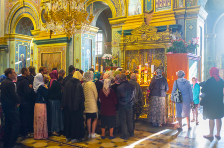 POCHAYIV, UKRAINE - AUGUST 30, 2017: Tselbonosnaya stop the Mother of God is one of the holiest relics of Pochaev Lavra collects huge queues of parishioners and pilgrims,  on August 30 in Pochayiv.のeditorial素材