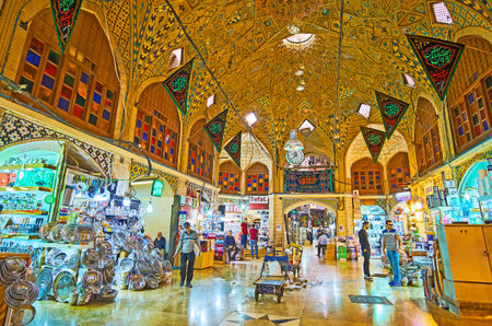 TEHRAN, IRAN - OCTOBER 11, 2017: Panorama of Timcheh-e Hajeb-od-Dowleh courtyard in Grand Bazaar, interior is decorated with stained glass windows, brick domes with tiled patterns, on October 11 in Tehran.のeditorial素材