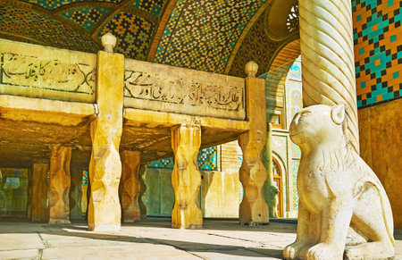 TEHRAN, IRAN - OCTOBER 11, 2017: The small marble throne behind the lion's sculpture in Karim Khani Nook, decorated with stone carvings and calligraphy, on October 11 in Tehran.のeditorial素材