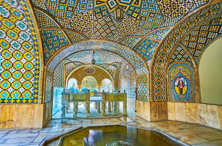 TEHRAN, IRAN - OCTOBER 11, 2017: The refreshing fountain and small marble throne in Khalvat-e Karim Khani, the cozy corner of Golestan palace, used as summer terrace, on October 11 in Tehran.のeditorial素材