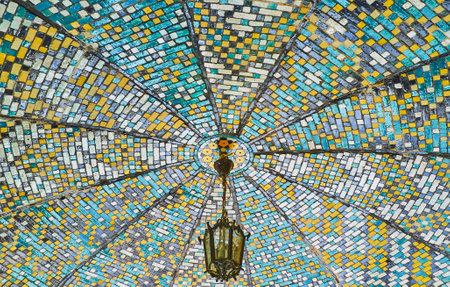 TEHRAN, IRAN - OCTOBER 11, 2017: The ceiling of Karim Khani Nook of Golestan palace covered with geometric tiled pattern, on October 11 in Tehran.のeditorial素材