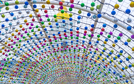 Christmas Arch of Wishes decorated with colorful christmas balls, Kiev, Ukraineの写真素材