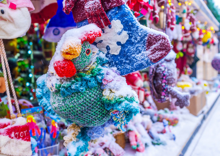 Handmade toys under the snow at the toy stall during Christmas Fair in Kiev, Ukraineの写真素材