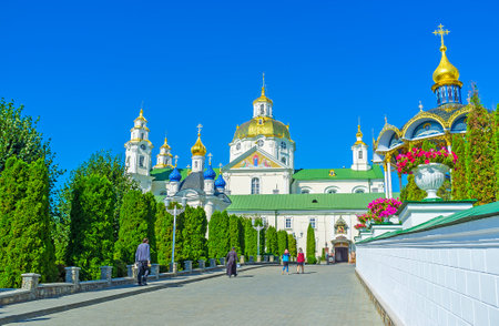 POCHAYIV, UKRAINE - AUGUST 30, 2017: Beautiful alley leading to Dormition Cathedral between gardens of the monastery complex, on August 30 in Pochayiv.のeditorial素材