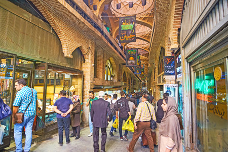 TEHRAN, IRAN - OCTOBER 11, 2017: The Grand Bazaar is the popular place of tourist shopping, people enjoy local trade traditions, exotic Eastern goods and handmade souvenirs, on October 11 in Tehran, Iran.のeditorial素材