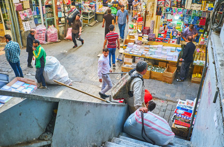 TEHRAN, IRAN - OCTOBER 11, 2017: The Grand Bazaar is always full of porters, carrying  goods between the different stores, on October 11 in Tehran.のeditorial素材