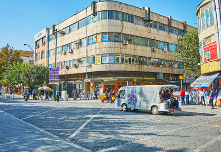 TEHRAN, IRAN - OCTOBER 11, 2017: The Walk along the wide Panzdah-e-Khordad street with numerous trade quarters, neighboring with Grand Bazaar, on October 11 in Tehran.のeditorial素材