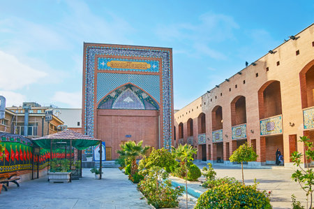 TEHRAN, IRAN - OCTOBER 11, 2017: The courtyard of the Cultural Complex of Islamic Revolution martyrs with the portal of restored mosque, on October 11 in Tehran.のeditorial素材