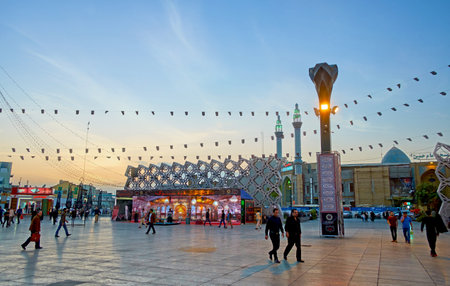 TEHRAN, IRAN - OCTOBER 11, 2017: The twilights over Imam Hossein Square, that is decorated with black flags and religious banners, due to Muharram Mourning, on October 11 in Tehran.のeditorial素材