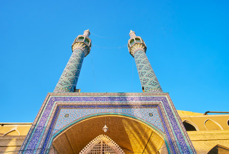 Tall minarets of Shahzade Fazl Holy Shrine decorated with tiles with geometrical patternのeditorial素材